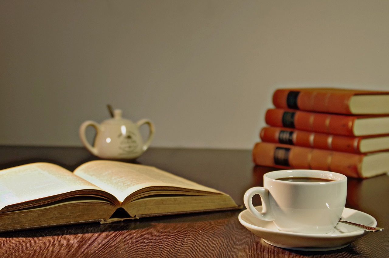 tea cup and books on a table
